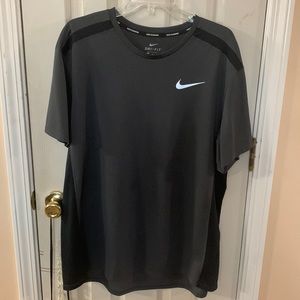 Grey/black Nike running shirt.